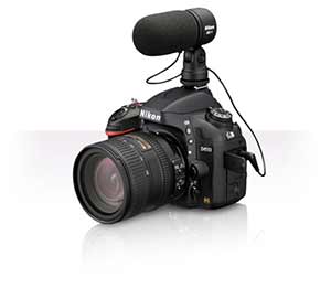 Nikon D610 product photo with a lens and the ME-1 stereo microphone attached.