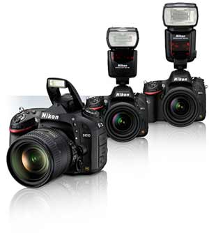 Three Nikon D610 cameras with lenses and Speedlights showing flash compatibility.